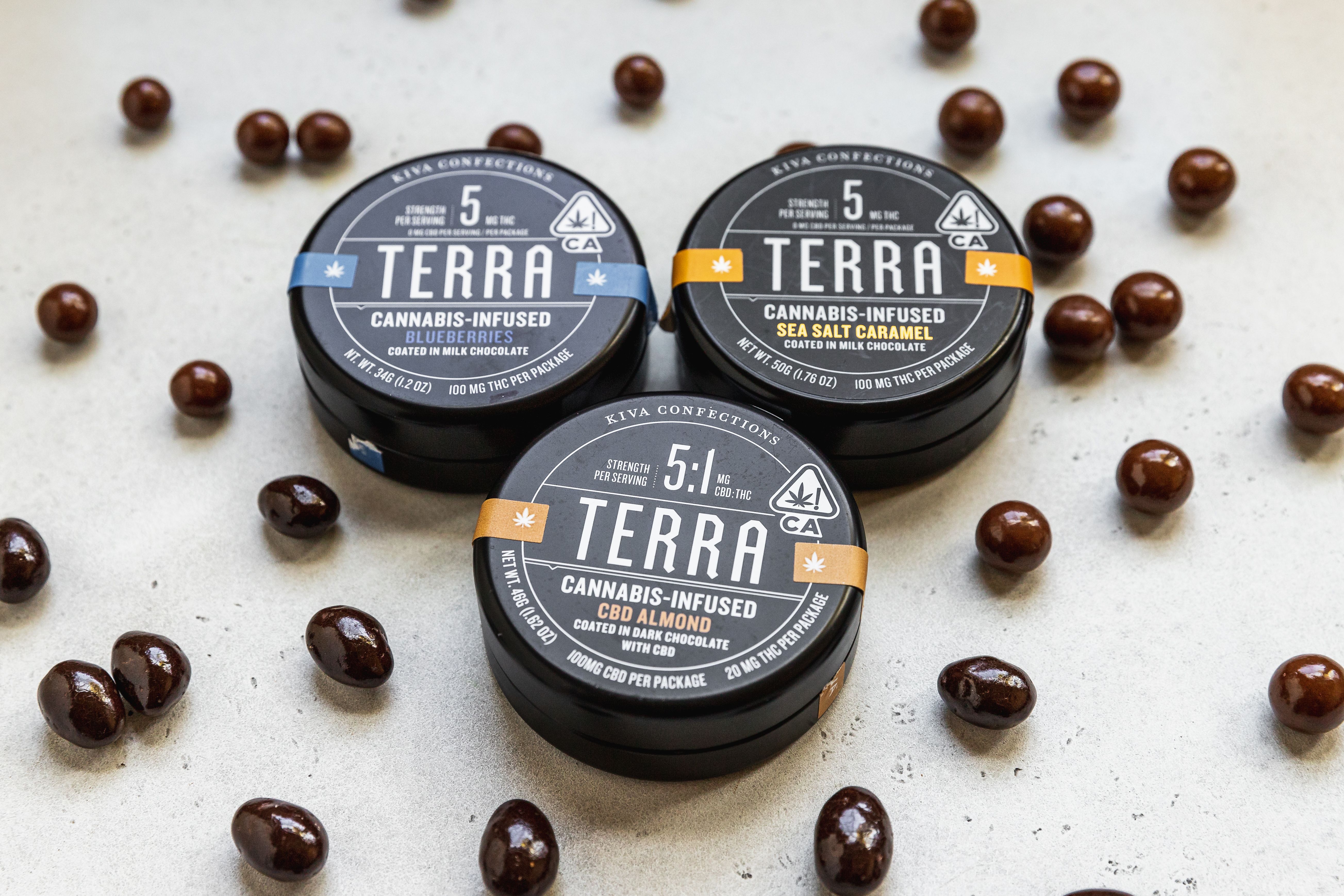 Cannabis-infused chocolate edibles in tin containers showing child-resistant packaging options